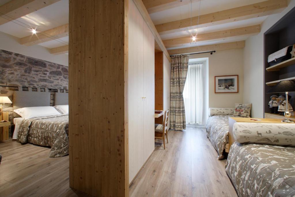 Hotel Savoia Dal 1924 San Martino Di Castrozza Szoba fotó