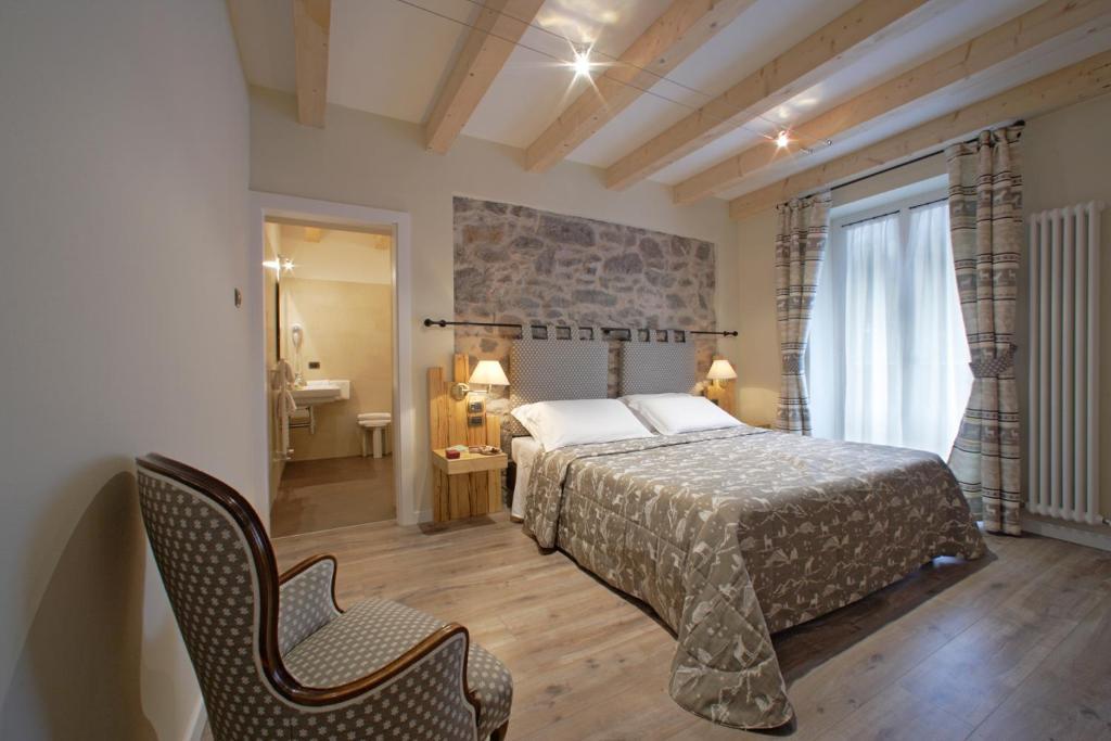 Hotel Savoia Dal 1924 San Martino Di Castrozza Szoba fotó